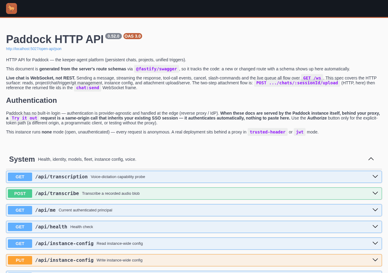 Paddock's generated Swagger UI at /open-api, showing the OpenAPI 3 document for version 0.52.0 and the System routes